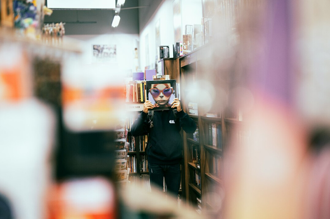 store security guard monitoring shoppers