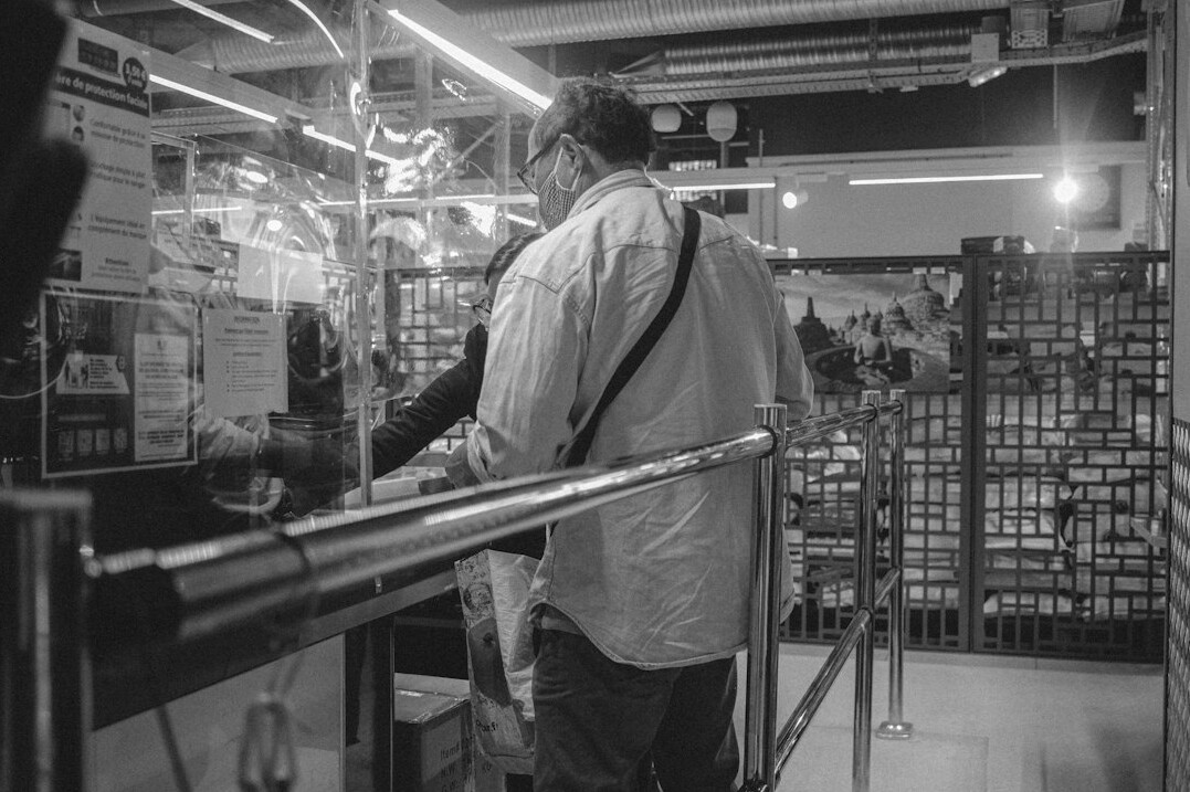 store security guard watching cameras