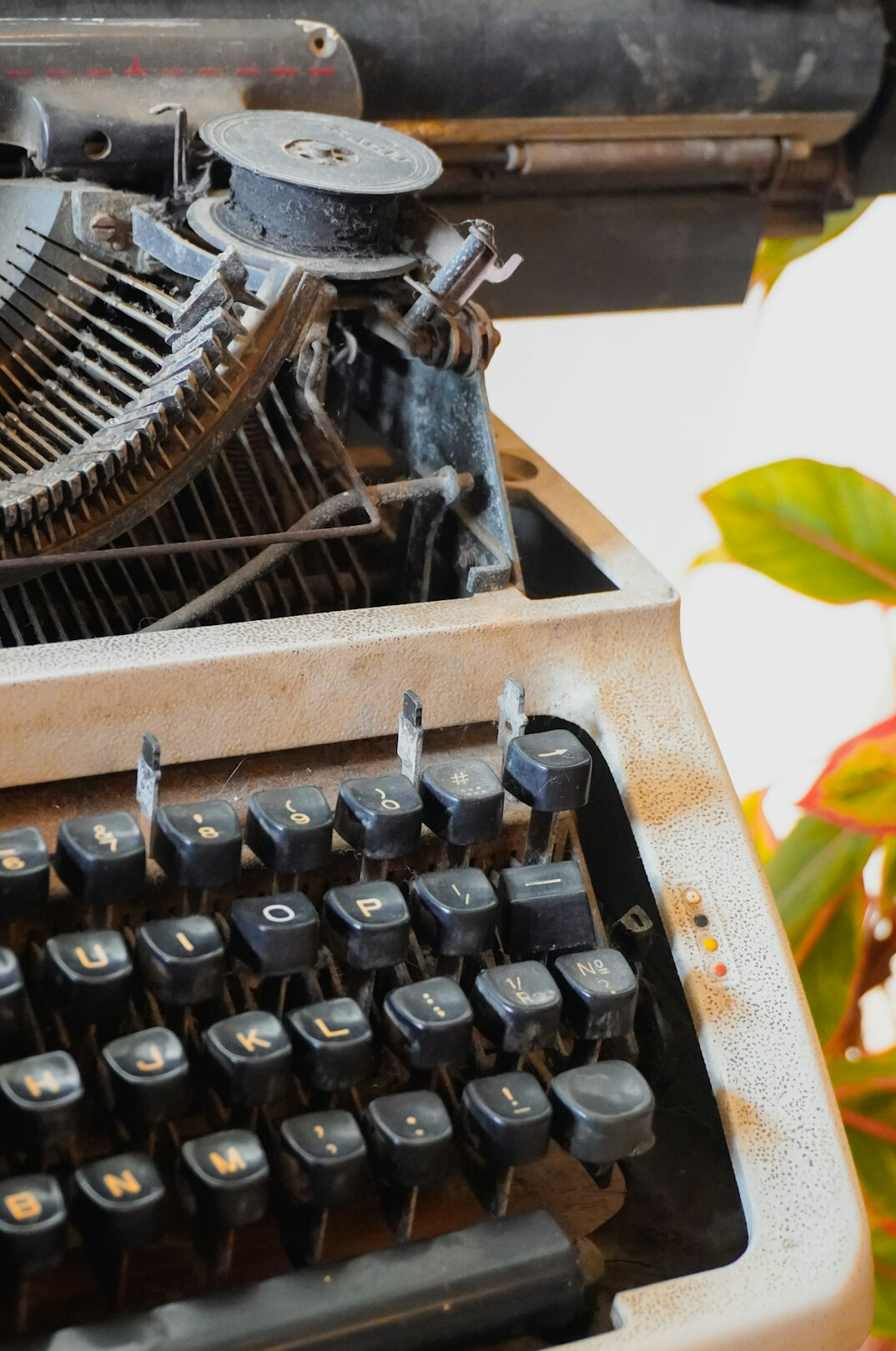 Close-up of a vintage typewriter with paper loaded